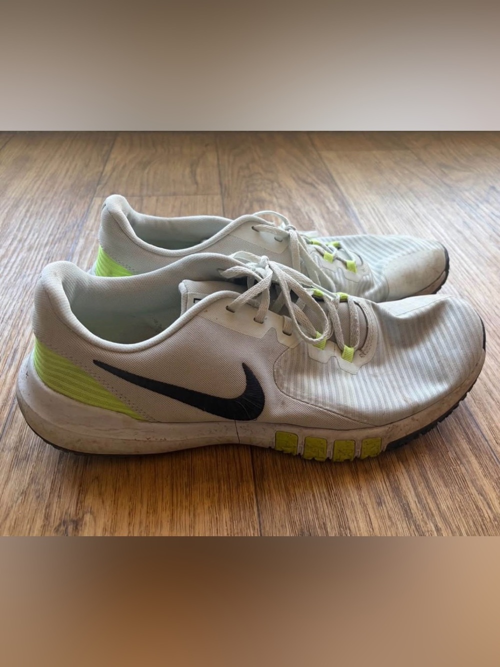 Nike Men’s White Athletic Sneakers with Black Swoosh and Neon Yellow Accents